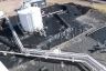 Aerial photo of secondary containment installation around diesel fuel storage tank farm