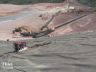 Observing placement of solution pond extraction pipe at Arizona mine